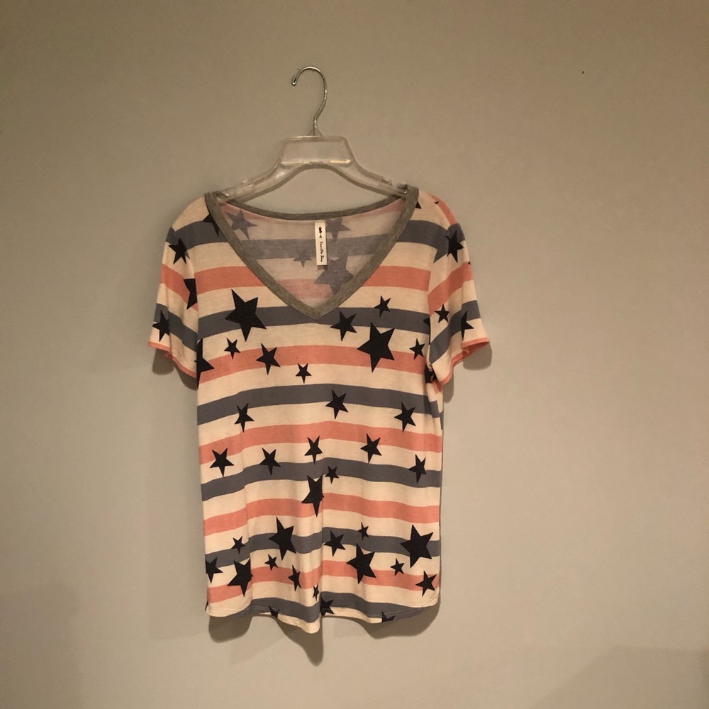 This top is a medium V-neck T-shirt by vanilla bay.
